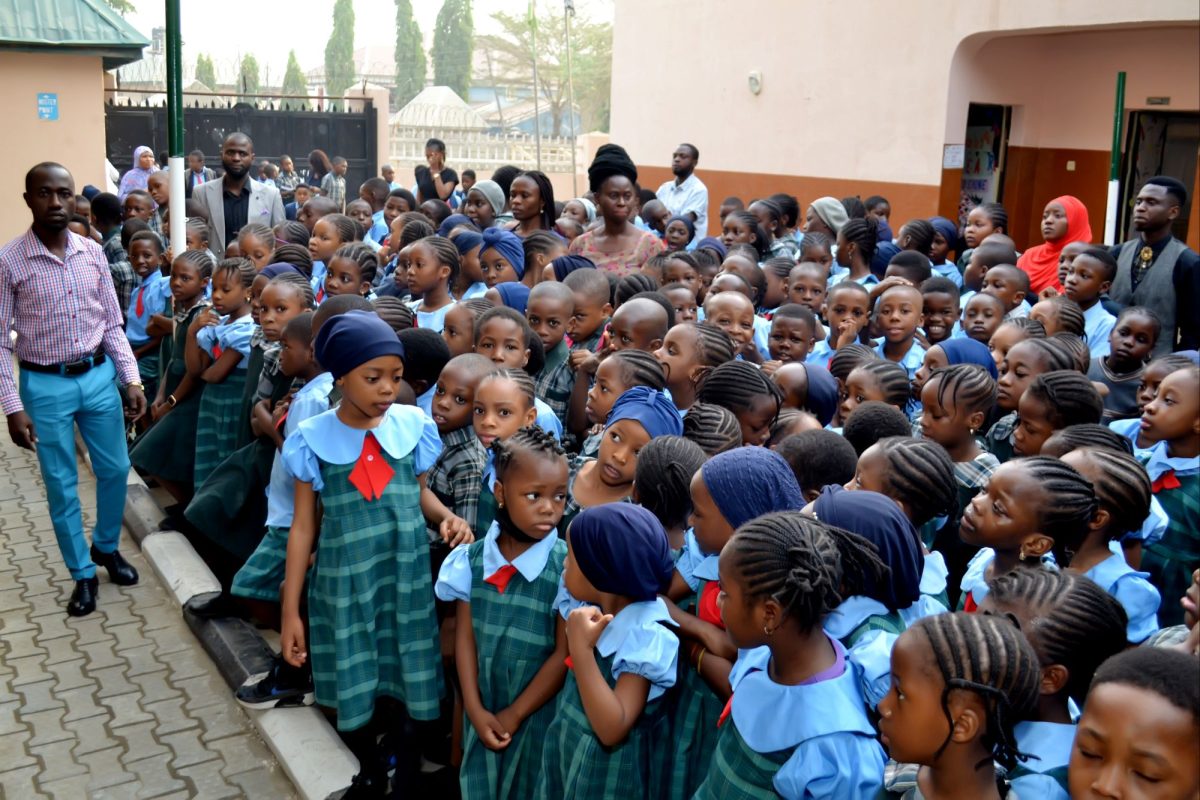 A group of children engaged in a learning activity.